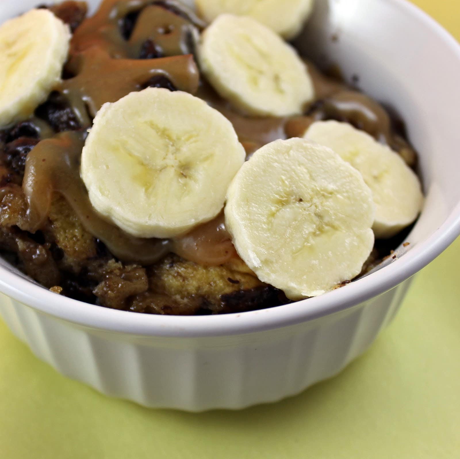 Bread Pudding with Peanut Butter-ROOT Sauce and Sliced Bananas