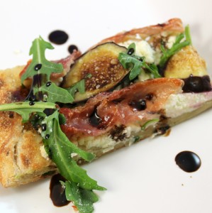 Prosciutto, Fig, Goat Cheese, & Arugula Flatbread with Balsamic Reduction