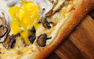 Wild Mushroom Truffled Pizza Topped with Runny Eggs